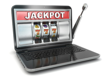 Jackpot. Online gambling concept. Laptop slot machine.