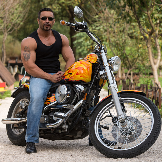 Muscular Man And Motorcycle