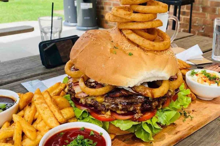 MAN CONQUERS KHARTOUM BADASS BURGER PubTIC